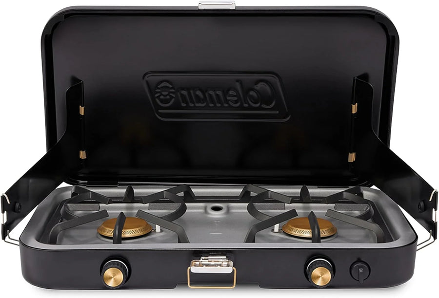 The 1900 series three-in-one propane camping stove, featuring a cast iron grill and frying pan accessories, has a power output of 24000 watts. It is equipped with an adjustable flame cover and excellent lighting device, and comes with two adjustable