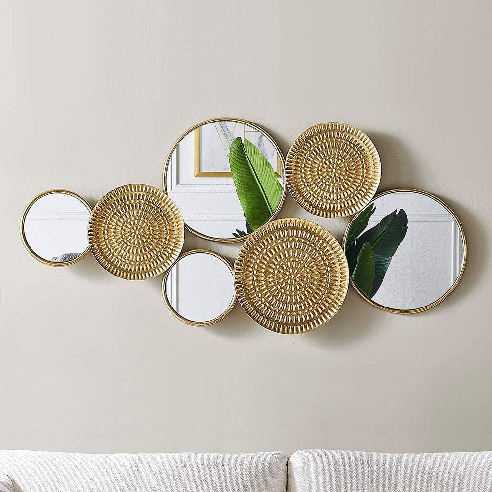Home decoration metal wall ornaments, a mirror with multiple circular lenses, large modern wall art sculptures for decoration, suitable for living rooms, offices, and bedrooms. Dimensions: 45.3 x 1.9 x 21.6 inches. Made of gold material.