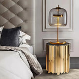 The amber desk lamp, the golden bedside lamp, the round bedside lamp for bedrooms and living rooms with a forged iron base, the glass lampshade and the LED bulb are all fully equipped. image 3