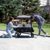 Luxurious 4-seater children's stroller - A high-end 4-seater children's stroller specially designed for 4 children, equipped with convertible seats, adjustable push-pull handles, detachable sunshade, and flat folding device. The color is grey. image 2