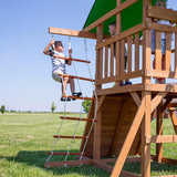 A complete set of wooden mountain-style swings, equipped with a colorful canvas sunshade, a wave slide, a rope swing, a net swing, and a rock wall with climbing ropes and ladders. image 2