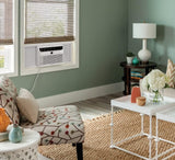 5000-watt window air conditioner, with a cooling area of 250 square feet, operates quietly, has easy and convenient temperature adjustment, 2 fan speeds, automatic restart function, and a white appearance image 4