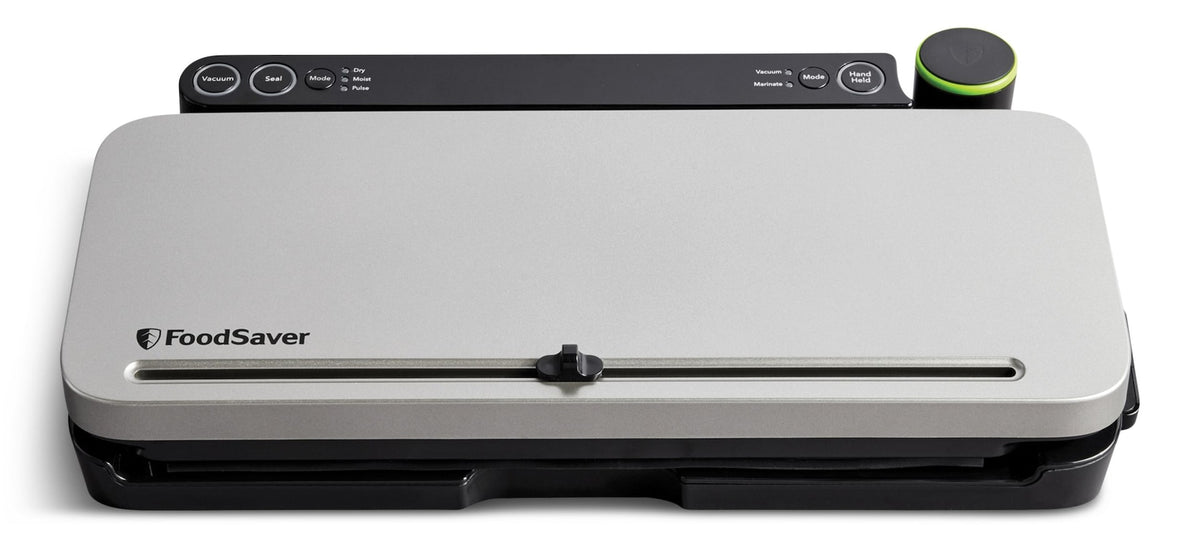 Foodsaver Vacuum Sealer + 4 Heat-Seal Rolls/Bags